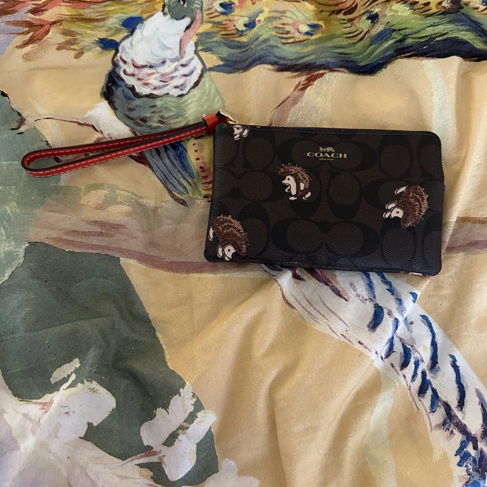 Coach Corner Zip Wristlet In Signature Canvas With Hedgehog Print